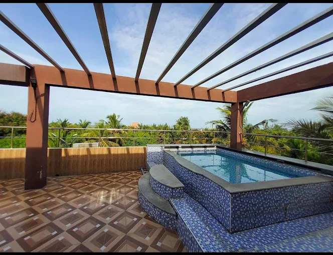 Rooftop pool with pergola